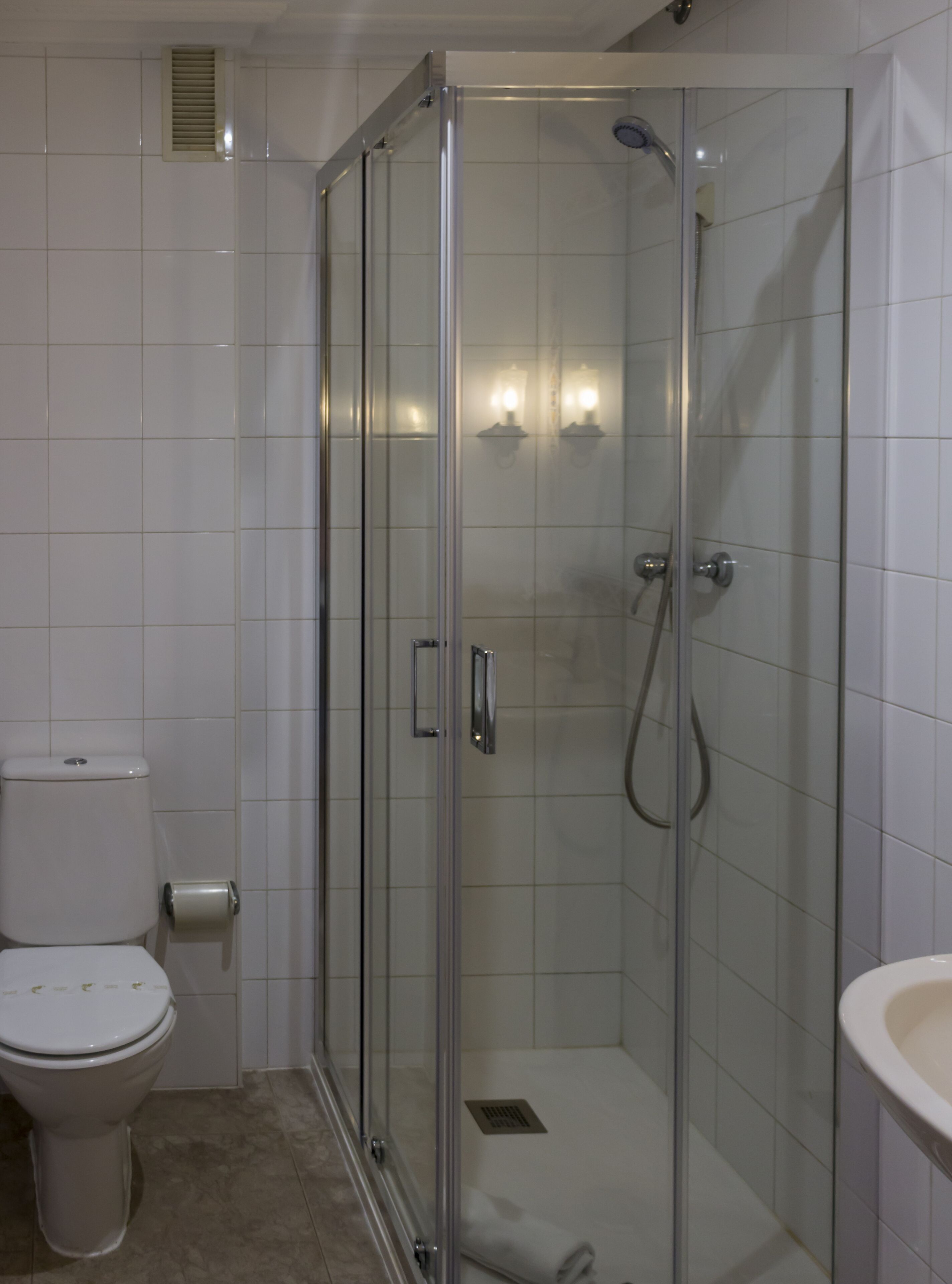 superior double room | bathroom | shower, rainfall showerhead, towels