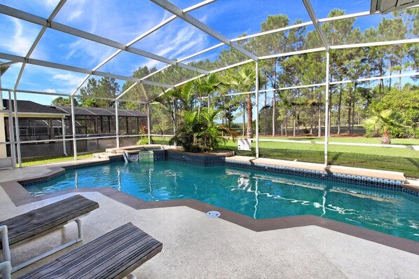 Seasonal outdoor pool, pool umbrellas, pool loungers