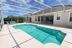 Seasonal outdoor pool, pool umbrellas, pool loungers