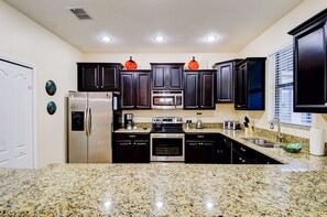 Family Villa, Balcony, Garden Area | Shared kitchen