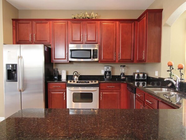 Family Villa, Balcony, Garden Area | Shared kitchen