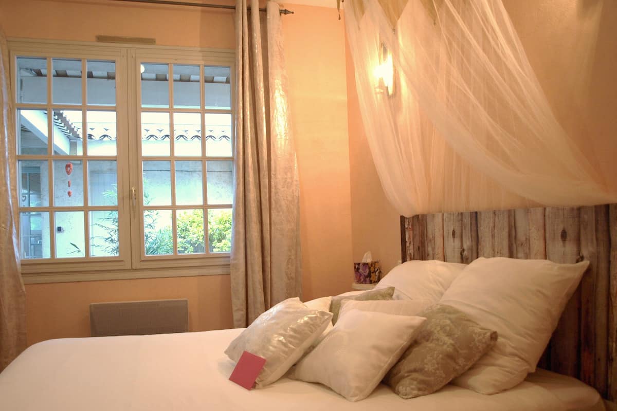 Blackout curtains, iron/ironing board, free WiFi, bed sheets