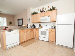 Family Villa, Balcony, Garden Area | Shared kitchen