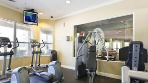 A gym with treadmills, elliptical machines, and weight equipment. - Ov2563 - Windsor Hills Resort - 3 Bed 3 Baths Townhome (Kissimmee)