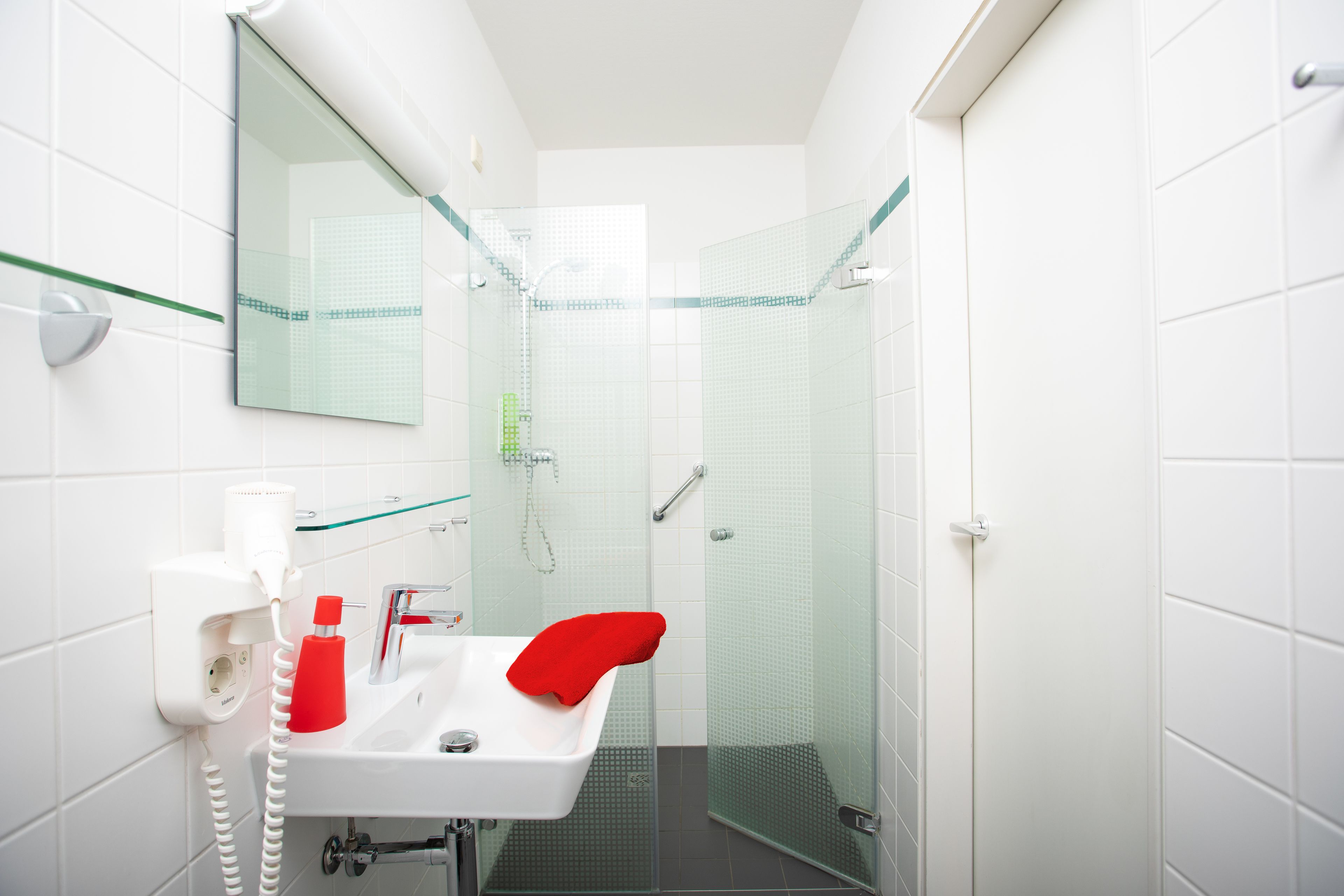 shower, eco-friendly toiletries, hair dryer, towels