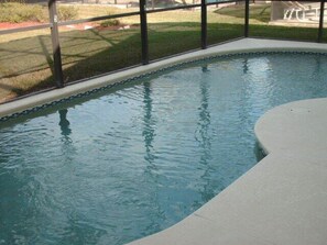 A swimming pool with a clear view of the surrounding area.