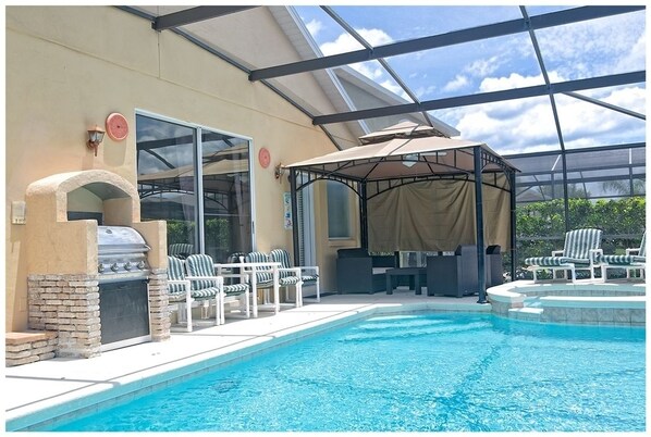 Family Villa, Hot Tub, Garden Area | Pool | Seasonal outdoor pool, pool umbrellas, sun loungers