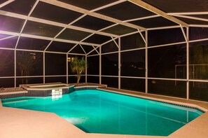 A swimming pool with a glass enclosure at night. - Ovm1446 - Westridge - 4 Bed 3 Baths Villa (Davenport)