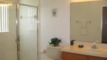 Family Villa, Hot Tub, Garden Area | Bathroom | Rainfall showerhead, hair dryer, towels, toilet paper