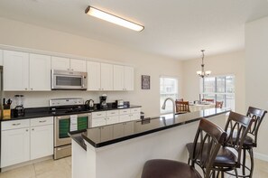 Family Villa, Hot Tub, Garden Area | Shared kitchen | Fridge, microwave, oven - Ovm1887 - The Sanctuary at West Haven - 5 Bed 3 Baths Villa (Davenport)