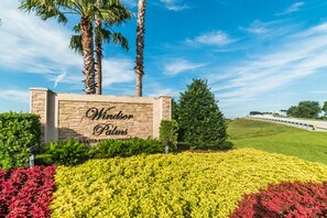 Windsor Palms sign stands proudly amidst a beautifully maintained garden.