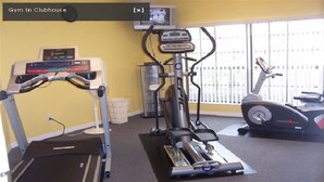 A gym with cardio equipment including a treadmill, elliptical, and stationary bike. - Ov2749 - High Grove - 4 Bed 3 Baths Villa (Clermont)