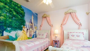 A bedroom with two beds, a mural of a castle, and a ceiling fan. - Ovm604 - Emerald Island - 6 Bed 5.5 Baths Villa (Kissimmee)