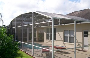 Seasonal outdoor pool, pool loungers