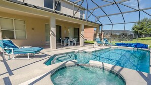 A pool area with lounge chairs and a hot tub. - Ov1138 - Emerald Island - 7 Bed 4.5 Baths Villa (Kissimmee)