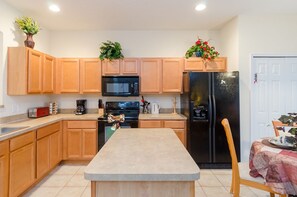 Family Villa, Multiple Bedrooms, Hot Tub, Garden Area | Shared kitchen | Fridge, microwave, oven - Ovm654 - Emerald Island - 7 Bed 4 Baths Villa (Kissimmee)