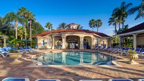 A pool area with lounge chairs and palm trees. - Ov474 - Emerald Island - 7 Bed 6 Baths Villa (Kissimmee)