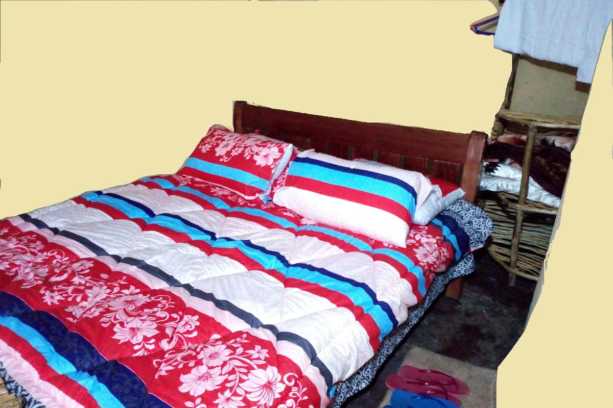 Desk, blackout drapes, iron/ironing board, bed sheets