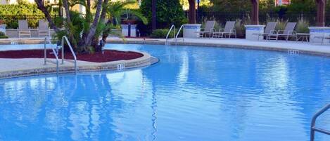 Seasonal outdoor pool, pool loungers
