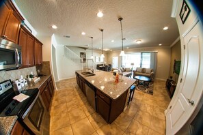 Family Condo, Balcony, Garden Area | Shared kitchen | Fridge, microwave, oven, toaster