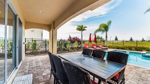 Family Condo, Balcony, Garden Area | Outdoor dining - Ov4819 - Reunion Resort - 5 Bed 4.5 Baths Villa (Kissimmee)