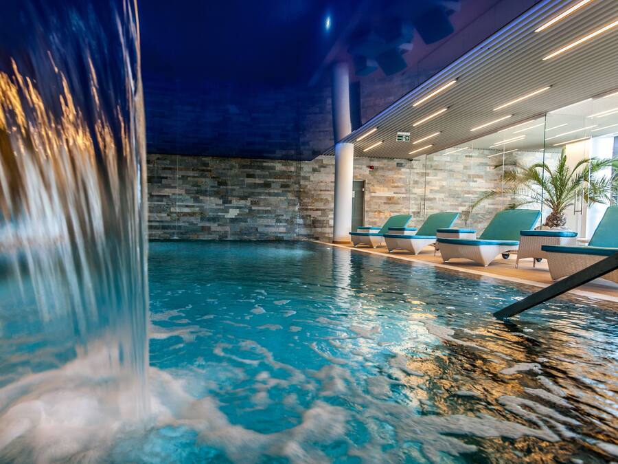 Indoor pool, open 10 AM to 10 PM, pool loungers