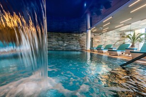 Indoor pool, open 10 AM to 10 PM, pool loungers