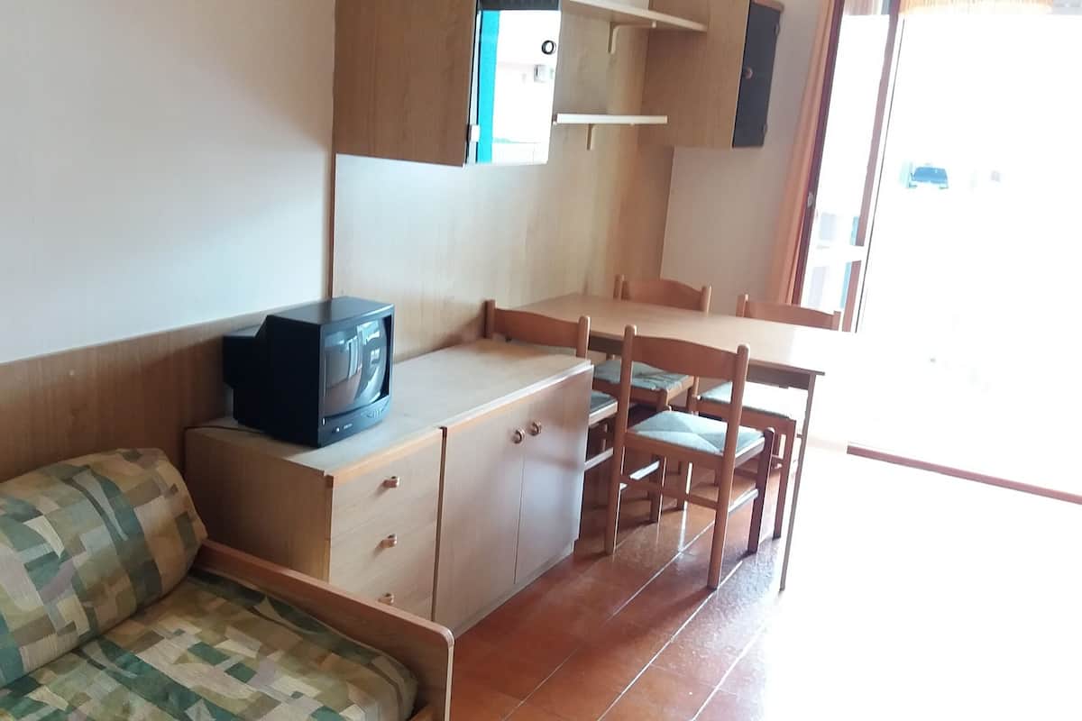 Apartment, 1 Bedroom, Terrace, Pool View | Living area | TV