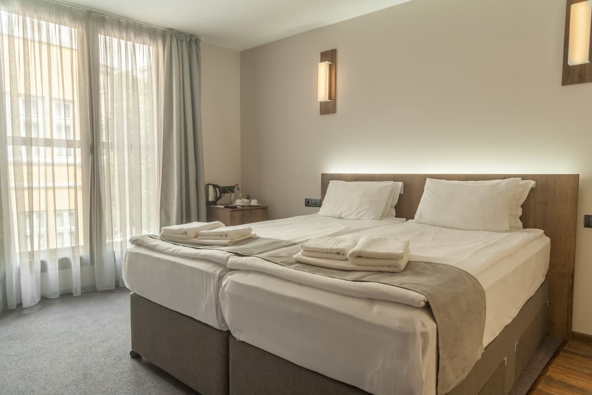 Double or Twin Room | Bar mini, seterika/papan seterika, katil bayi/kot (percuma)