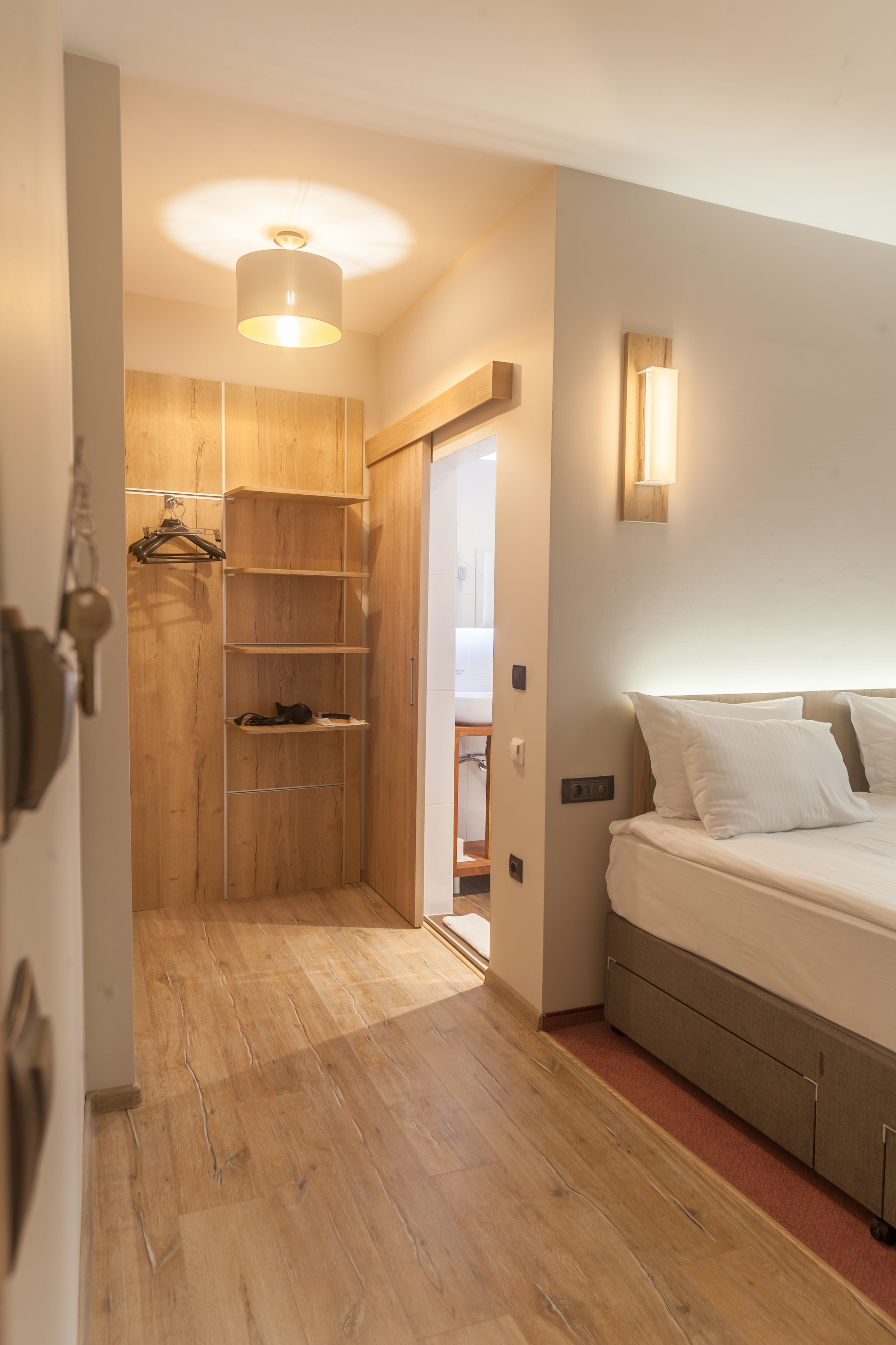 economy room (semi-basement) | minibar, iron/ironing board, free cots/infant beds, free wifi