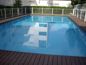 Seasonal outdoor pool, open 10:00 AM to 6:30 PM, sun loungers