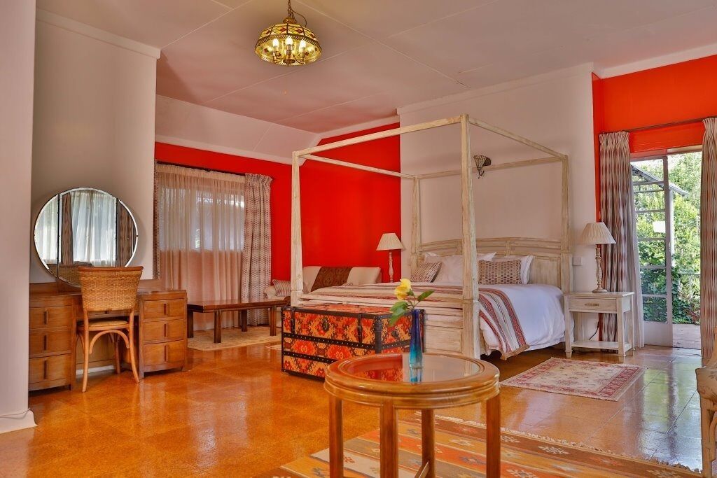 Suite Deluxe, 1 cama King size, balcón, vista al jardín | Sábanas de algodón egipcio, ropa de cama de alta calidad y edredón 