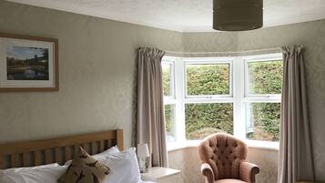 Double Room | Iron/ironing board, free cribs/infant beds, free WiFi, bed sheets