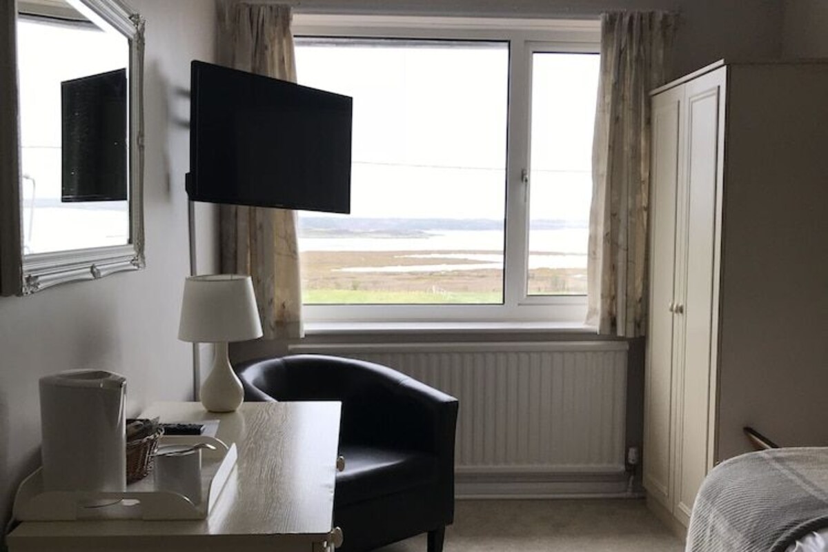 Iron/ironing board (on request), cribs (free), WiFi (free), bed sheets