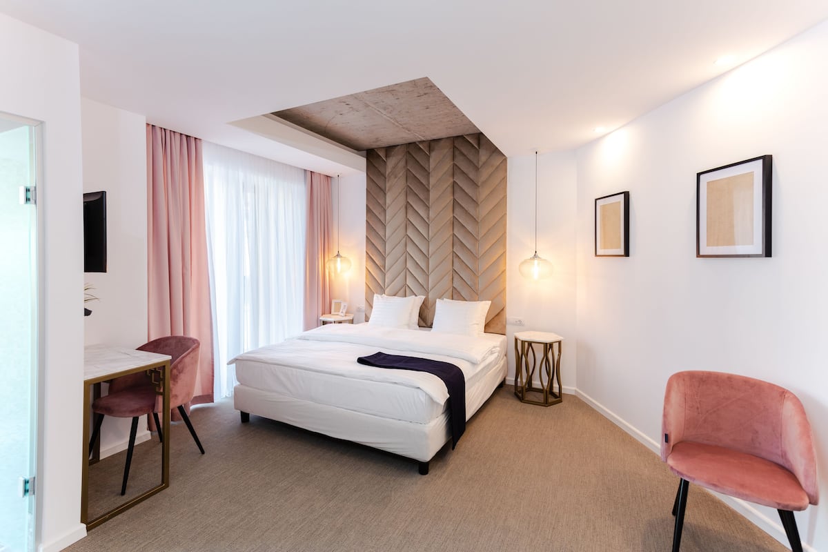 Deluxe Double Room, Balcony | Minibar, in-room safe, desk, blackout curtains