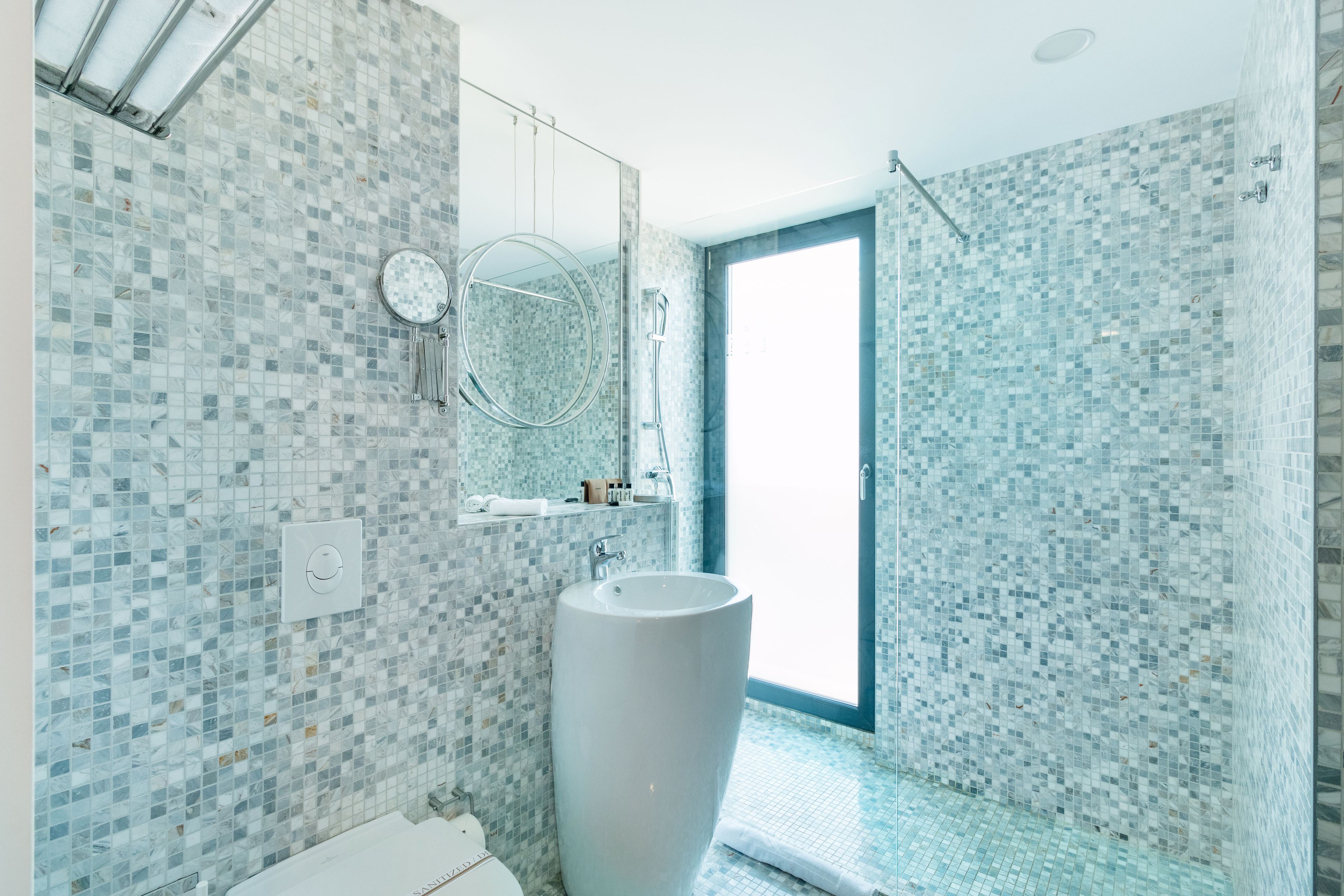 deep-soaking bathtub, free toiletries, hair dryer, bathrobes