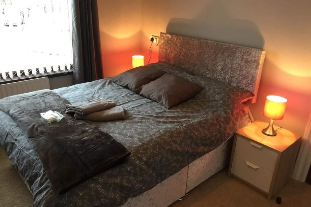Desk, laptop workspace, blackout curtains, free WiFi