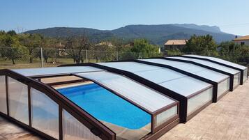 Indoor pool, seasonal outdoor pool, pool umbrellas