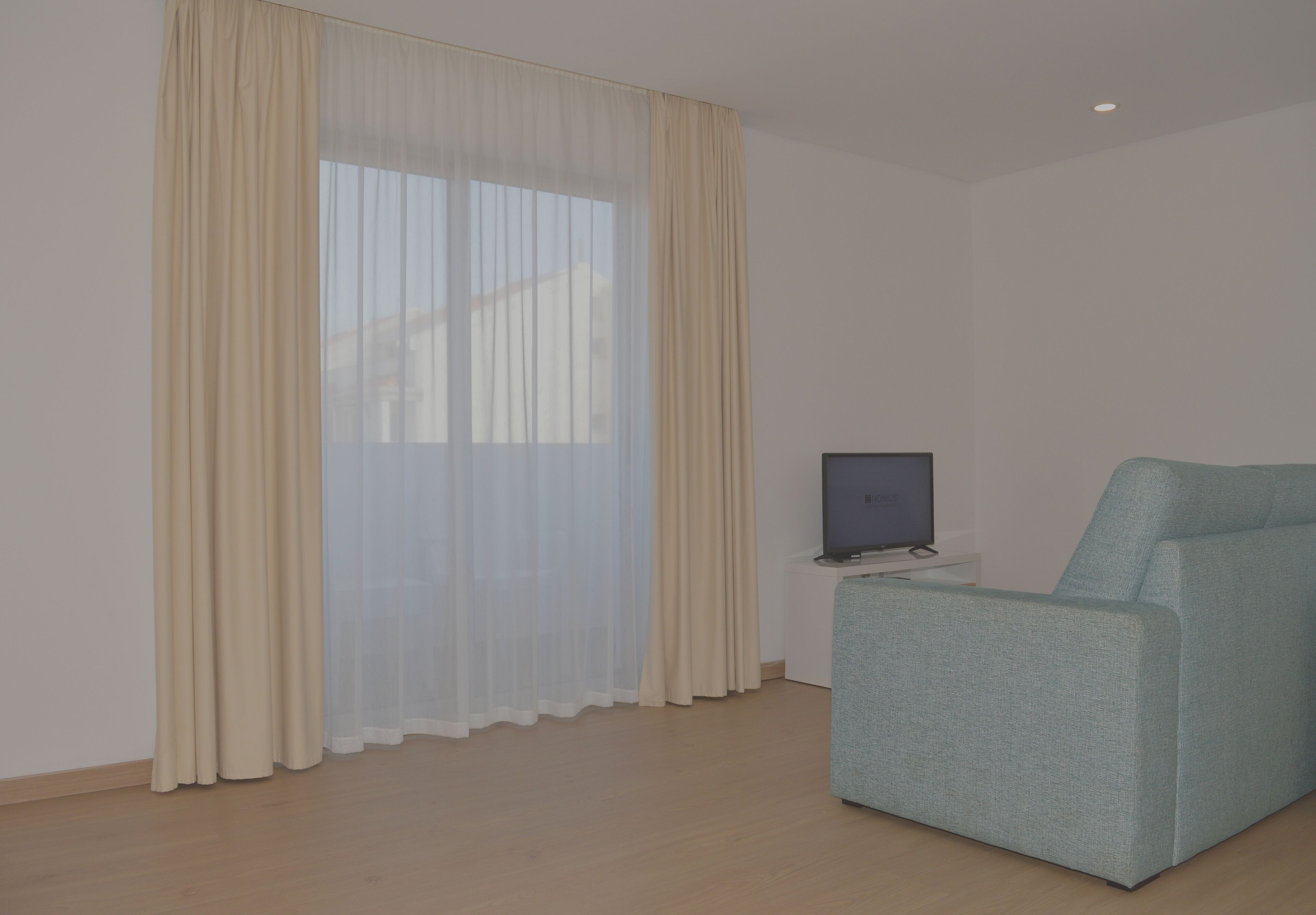 family apartment, 2 bedrooms, kitchenette, city view | living room | 32-inch lcd tv with satellite channels, tv