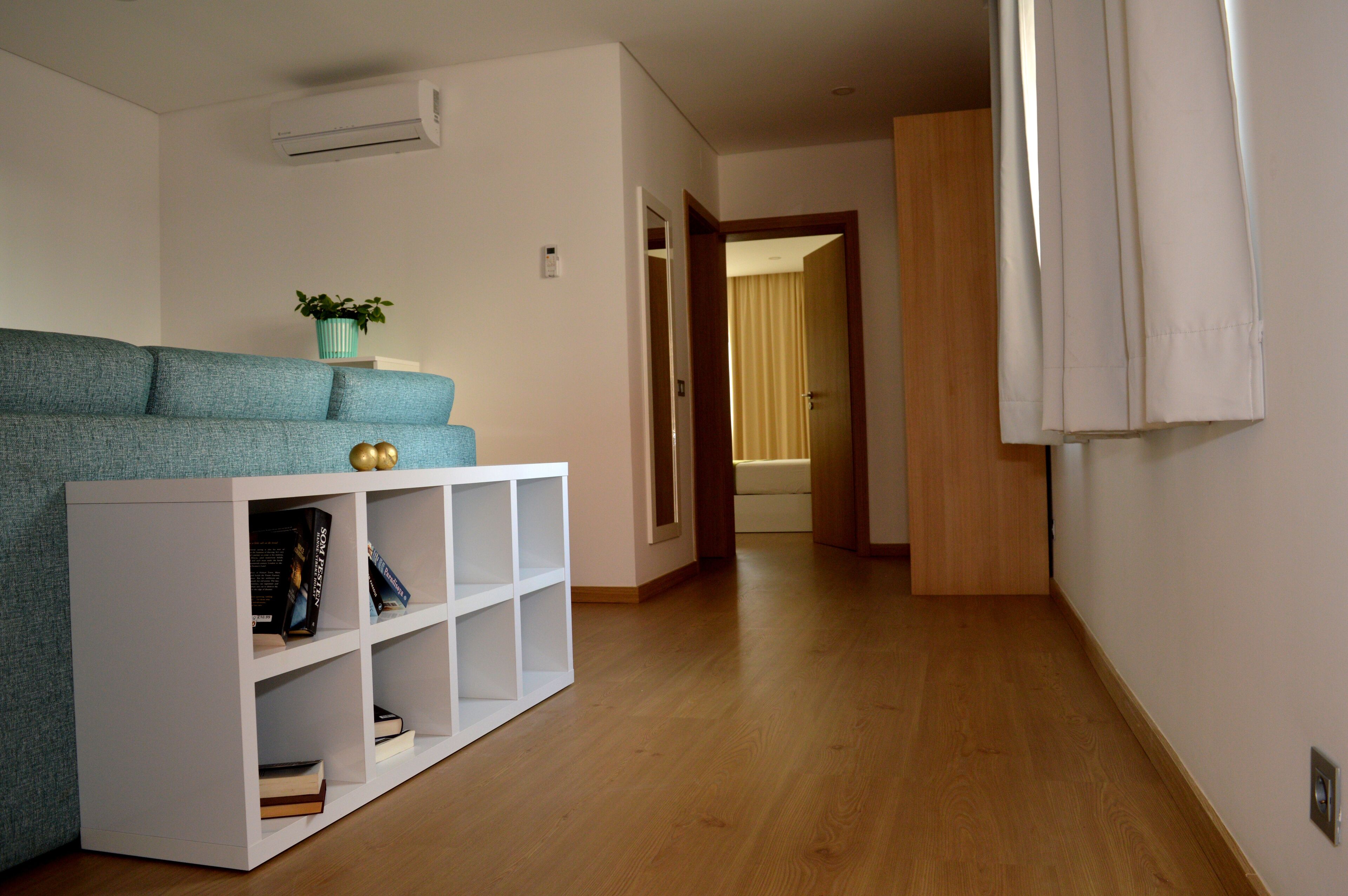 family apartment, 2 bedrooms, kitchenette, city view | living room | 32-inch lcd tv with satellite channels, tv