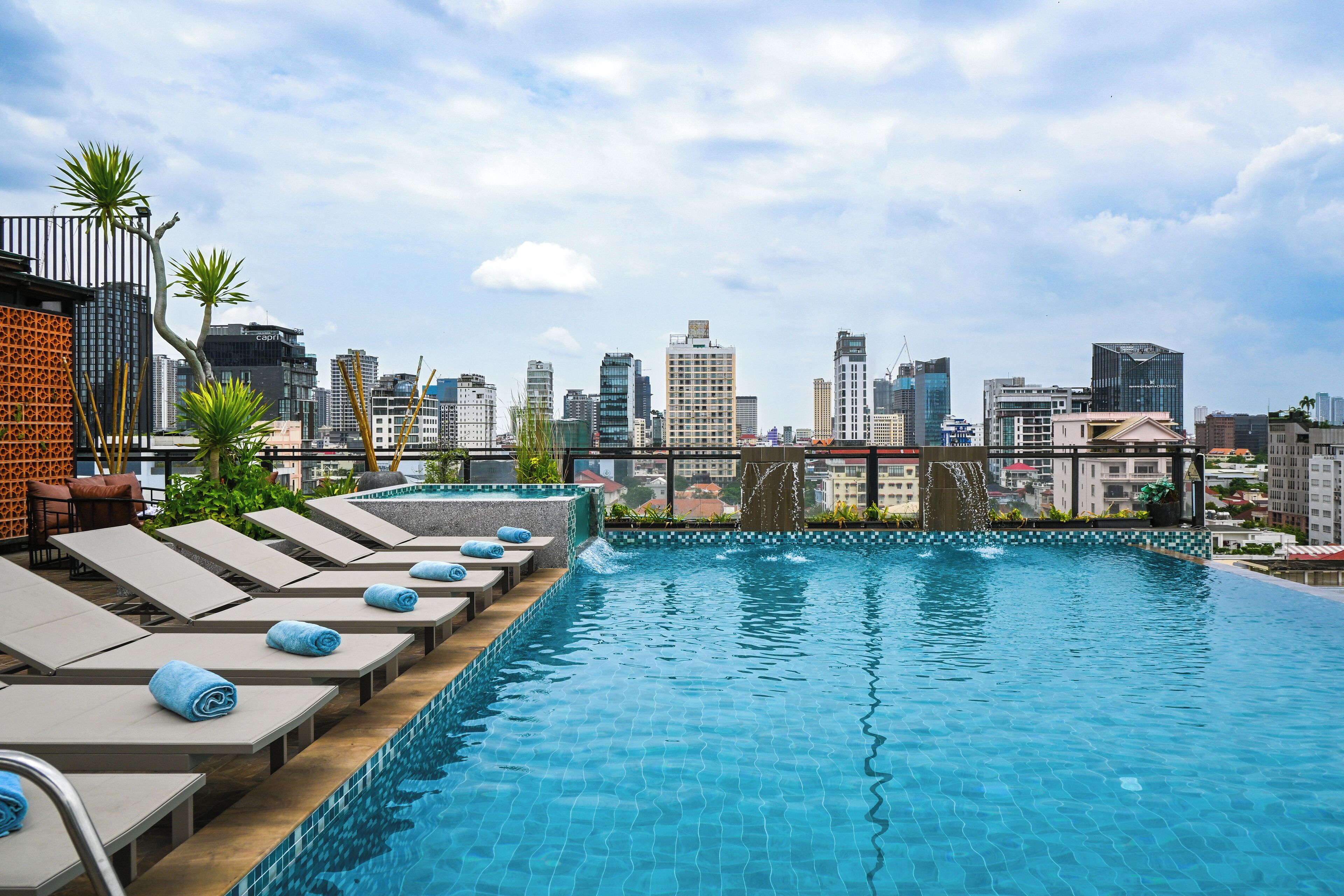 outdoor pool, open 6:30 am to 11:00 pm, pool umbrellas, pool loungers