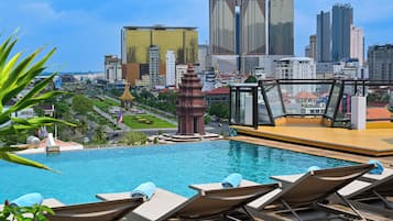 Outdoor pool, open 6:30 AM to 11:00 PM, pool umbrellas, sun loungers