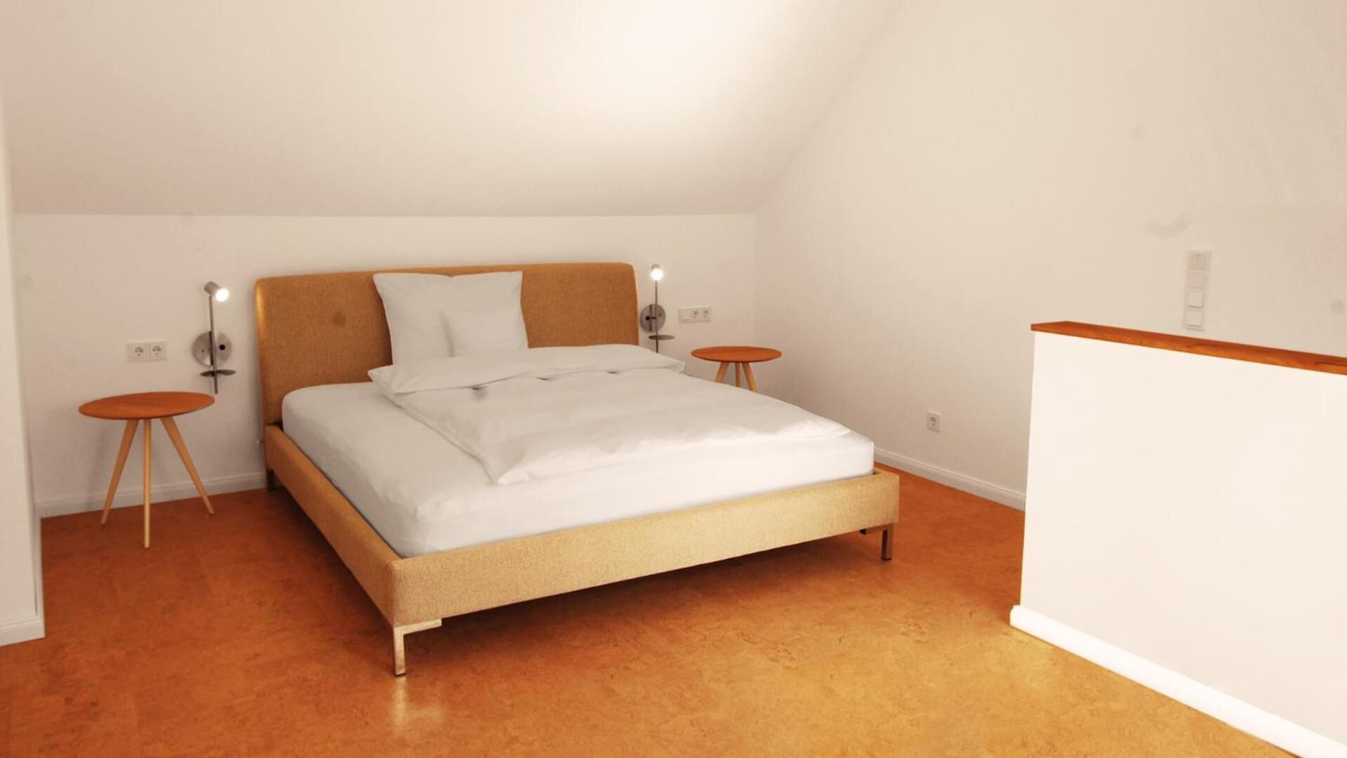 A bedroom with a bed, two bedside tables, and a nightstand.