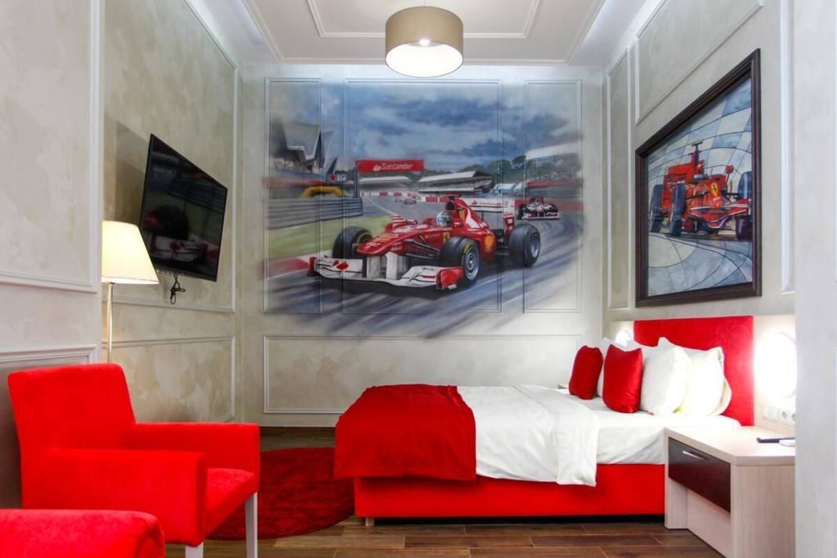 Junior suite, 1 queensize bed met slaapbank (Ferrari) | Verduisterende gordijnen, geluiddichte muren