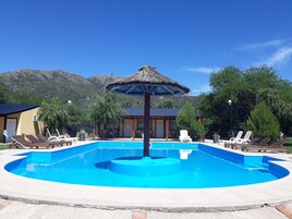 Seasonal outdoor pool, open 10 AM to 8 PM, sun loungers