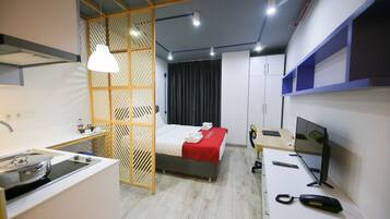 Premium bedding, blackout drapes, iron/ironing board, free WiFi