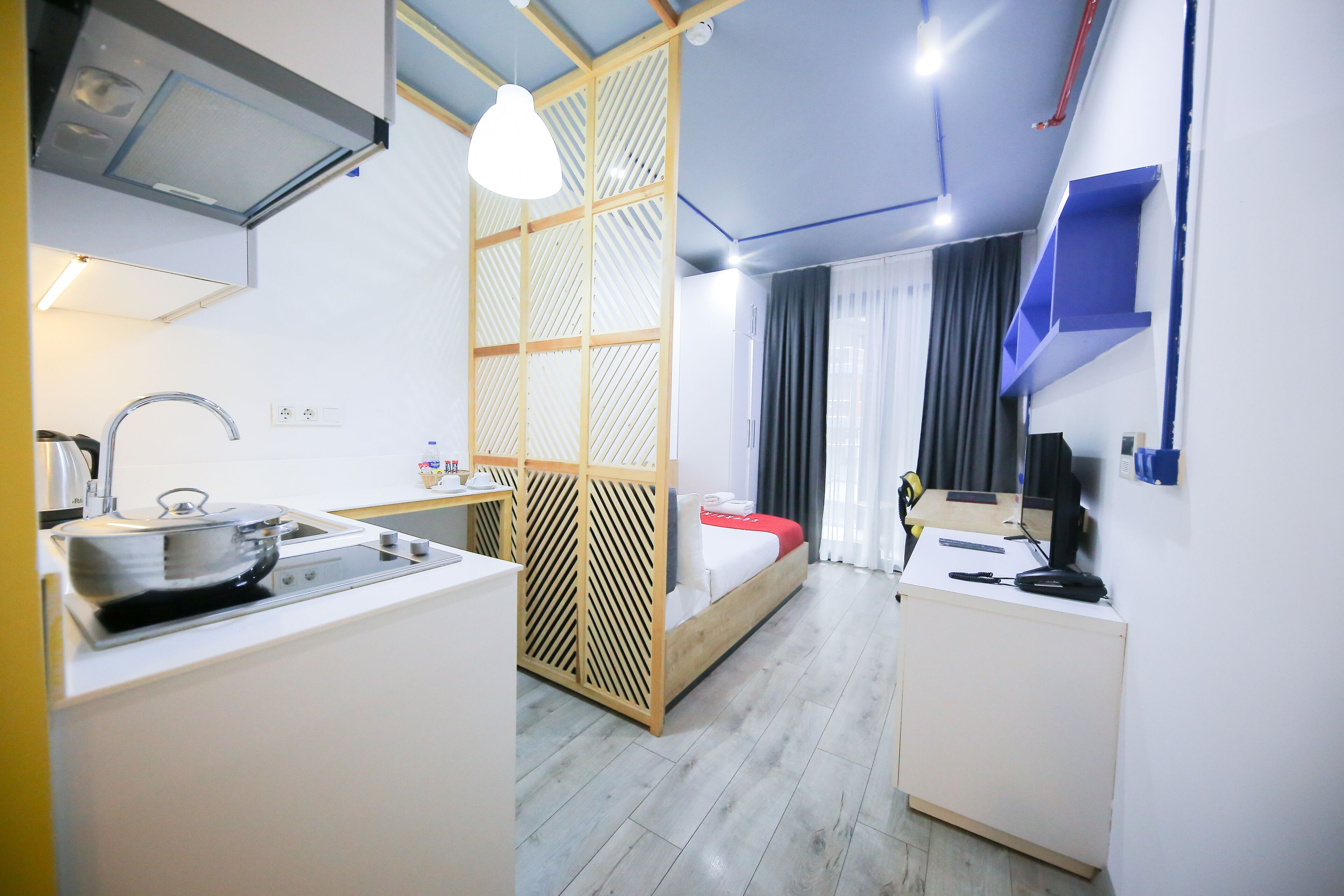 classic studio, 1 large single bed | premium bedding, blackout curtains, iron/ironing board, free wifi