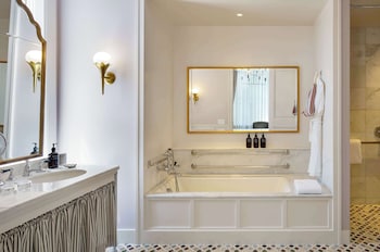 Separate tub and shower, deep soaking tub, designer toiletries at Maison Metier, in the Unbound Collection by Hyatt