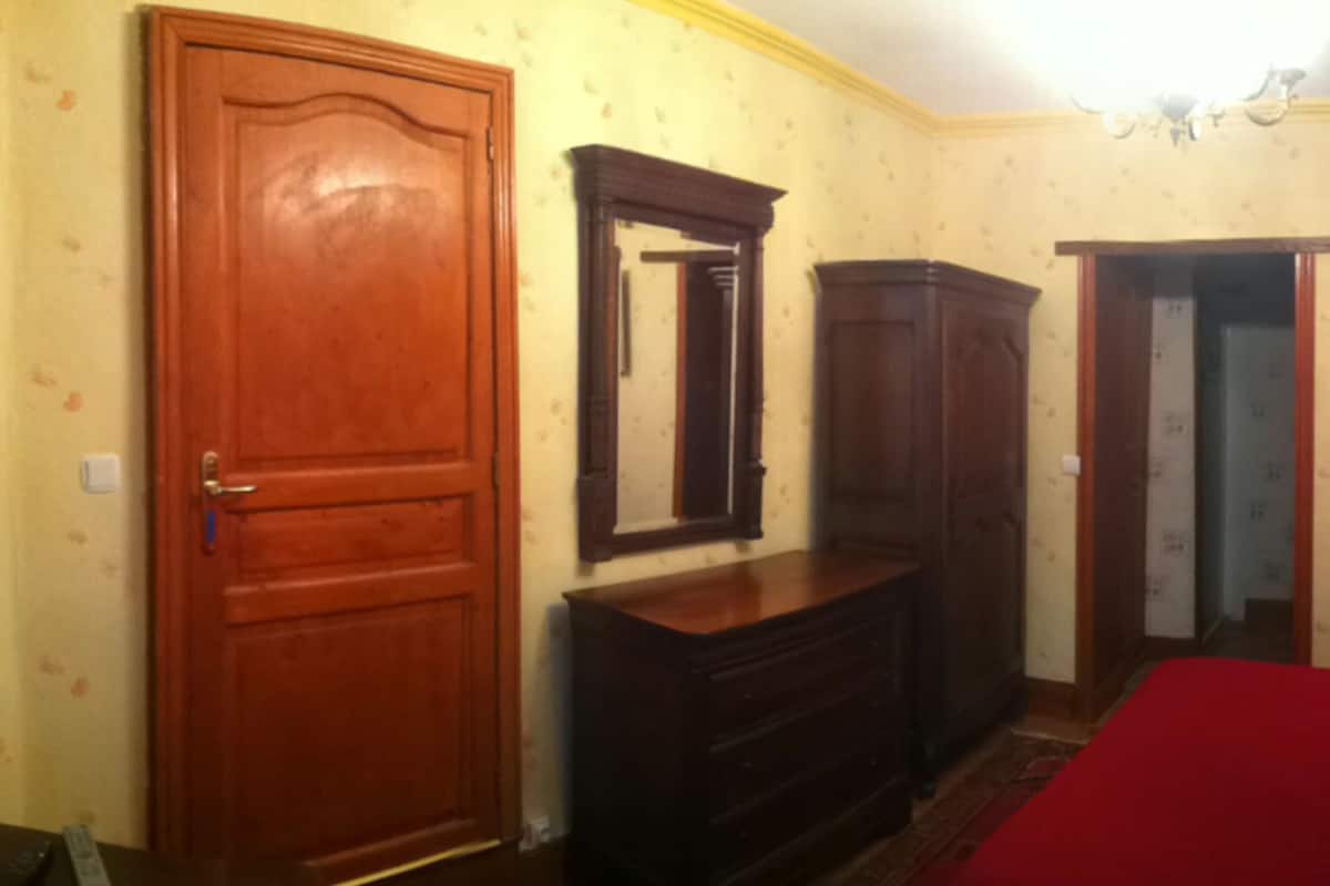 Individually decorated, individually furnished, desk, rollaway beds