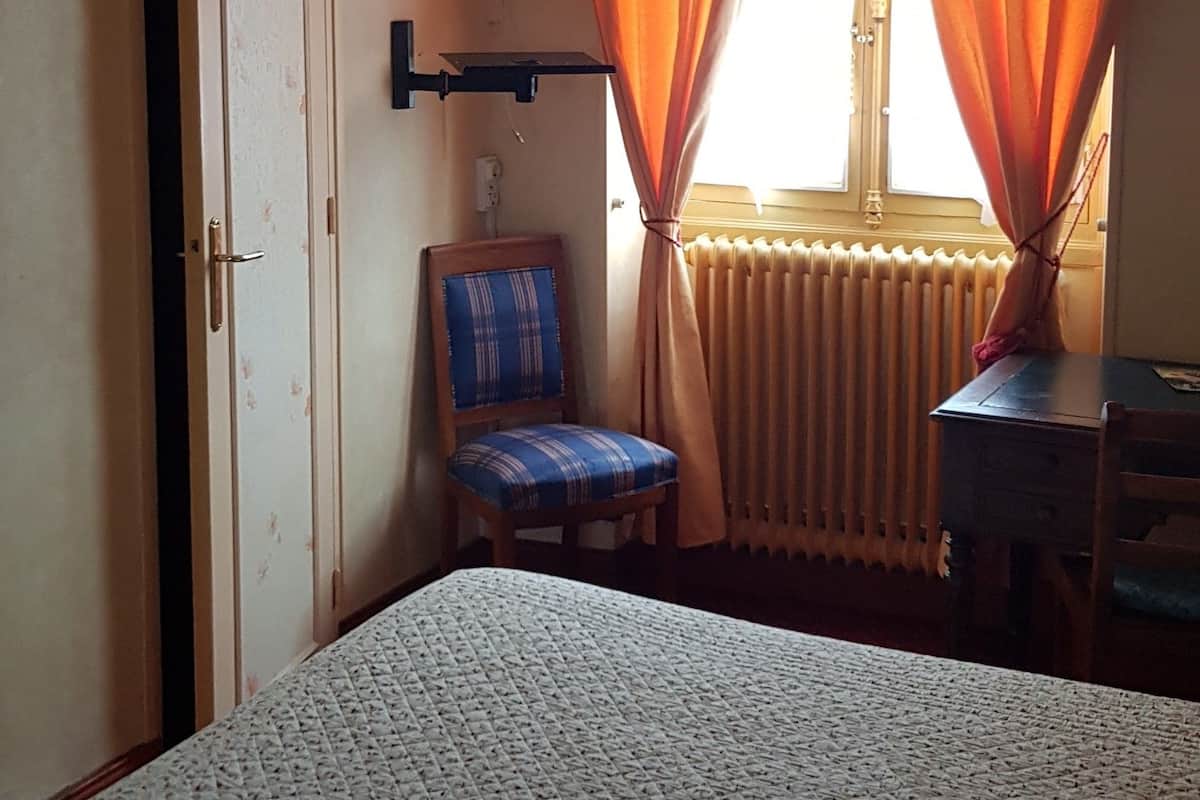 Individually decorated, individually furnished, desk, rollaway beds